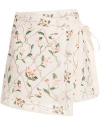 Agua Bendita - Luna Floral-Print Mini Wrap Skirt - Lyst