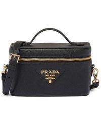 Prada - Logo-plaque leather mini bag - Lyst