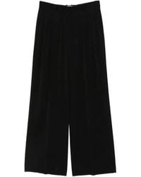 The Row - Pleated Wide-Leg Trousers - Lyst