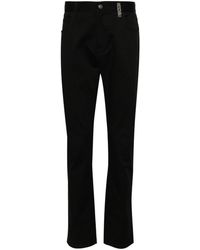 Moschino - Mid-rise Logo-engraved Straight-leg Jeans - Lyst