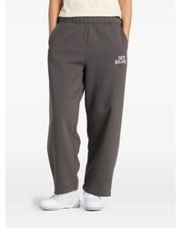 New Balance - Trackside Fleece Barrel Pants - Lyst
