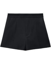 Alexander Wang - High-Waist Elastische Mini-Shorts Met Logo - Lyst