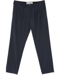 Les Hommes - Pleated Logo-Plaque Trousers - Lyst
