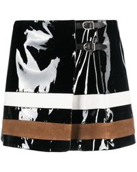 DURAZZI MILANO - Buckle-fastening Patent-leather Miniskirt - Lyst