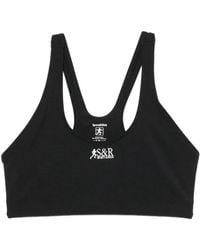 Sporty & Rich - Logo-Print Racerback Sports Bra - Lyst