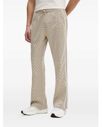Guess - Monogram-Pattern Side-Stripe Track Pants - Lyst