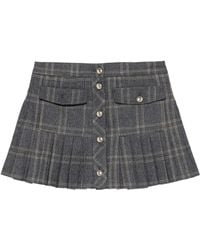 Maje - Falda corta a cuadros con pliegues - Lyst