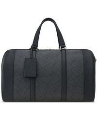 Ferragamo - Monogram-Print Duffle Bag - Lyst