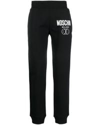 Moschino - Pantalon de jogging en coton à logo imprimé - Lyst