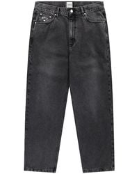 Arte' - Faded-Effect Logo-Patch Jeans - Lyst