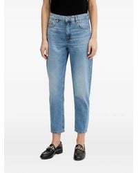 Benetton - Vaqueros Con Parche Del Logo - Lyst