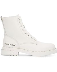 Calvin Klein Stivali stringati con borchie - Bianco