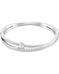Swarovski - Hyperbola Crystal-Embellished Bangle - Lyst