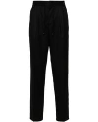 Brunello Cucinelli - Pleat-Detail Tapered Trousers - Lyst