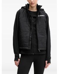 adidas - Chaleco acolchado con capucha - Lyst