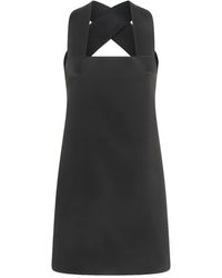 KHAITE - Cross-Over Backless Mini Dress - Lyst