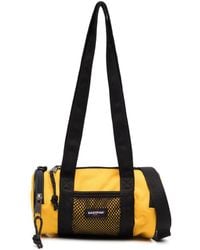 Eastpak - X Telfar Cylinder Messenger Bag - Lyst