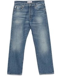 Valentino Garavani - Logo-Patch Jeans - Lyst