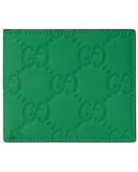 Gucci - GG Rubber-effect Bi-fold Wallet - Lyst