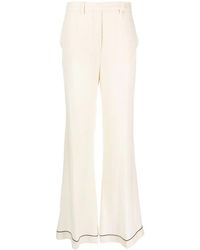 Prada - High-Waisted Flared Silk Trousers - Lyst
