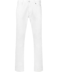 Emporio Armani - Jeans slim con logo posteriore - Lyst