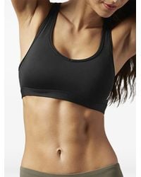 Reebok - Studio Racerback Sports Bra - Lyst