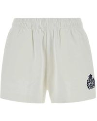 Sporty & Rich - Ny Crest Embroidered Disco Shorts - Lyst