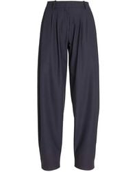 Ferragamo - Pleated Tapered Trousers - Lyst