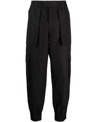 McQueen - Pantalones cargo con bolsillos - Lyst