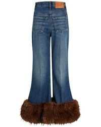 A.W.A.K.E. MODE - Faux-Fur Hem Flared Jeans - Lyst