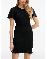 Guess - Vestido corto con dobladillo de volantes - Lyst