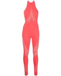 Womens Jumpsuits and rompers Wolford Jumpsuits and rompers Grey Wolford Monogram Flower Net Lace Jumpsuit in Black 