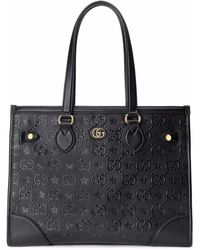 Gucci - Bolso shopper mediano con logo GG en relieve - Lyst