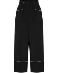A.M.G - Pantalones de pijama con ribetes en contraste - Lyst