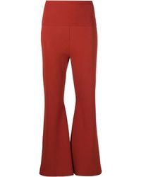 Stella McCartney - Compact Knit Flared Trousers - Lyst