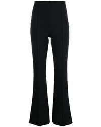 Wolford - X Simkhai Seamed Flared Trousers - Lyst