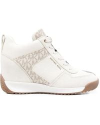 Michael Kors - Nikko Monogram-Print Wedge Sneakers - Lyst