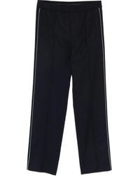 Gucci - Pantalones con parche del logo - Lyst