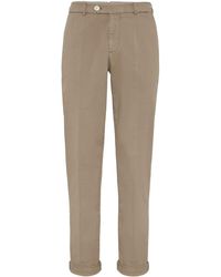 Brunello Cucinelli - Pantalones ajustados con pinzas - Lyst