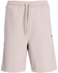 BOSS - Pantalones cortos de deporte con rayas laterales - Lyst