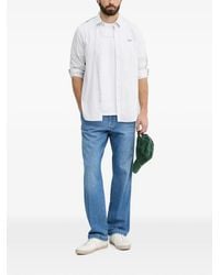 Guess - Logo-Patch Straight-Leg Jeans - Lyst