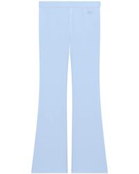 Courreges - Tech Jersey Flared Trousers - Lyst
