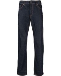 Levi's - Halbhohe Slim-Fit-Jeans - Lyst