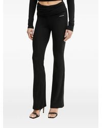 La Mania - Pantalon Évasé À Logo Imprimé Jake - Lyst