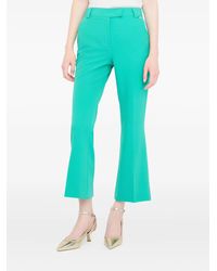 Liu Jo - Metal Logo Flared Trousers - Lyst
