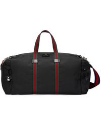 Gucci Supreme Logo Canvas Flight Bag in Black for Men - Save 27% - Lyst