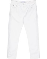 Calvin Klein - Tapered-leg Cropped Jeans - Lyst
