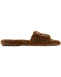 Miu Miu - Slippers con aplique del logo - Lyst