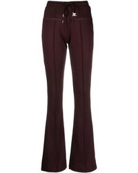 Courreges - Logo-embroidered Flared Trousers - Lyst