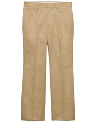 Prada - Trumpet-Flare Cotton Trousers - Lyst